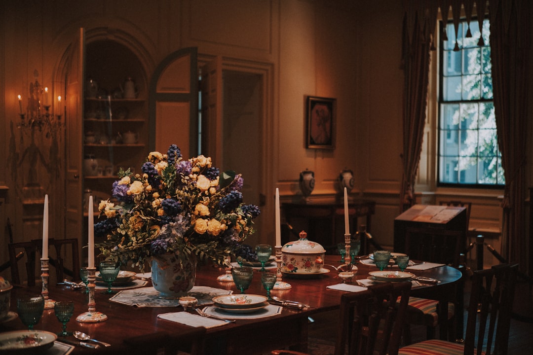 Private dining alcove with linen tablecloth and floral arrangement